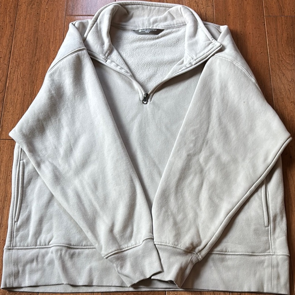 Woman’s Cream Quarter-Zip Sweater